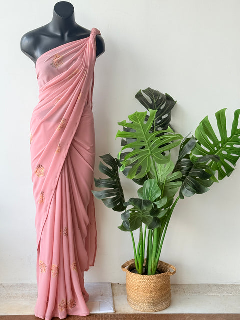 Peach maple leaf emb georgette saree