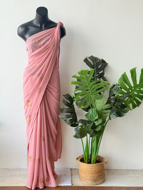 Peach maple leaf emb georgette saree