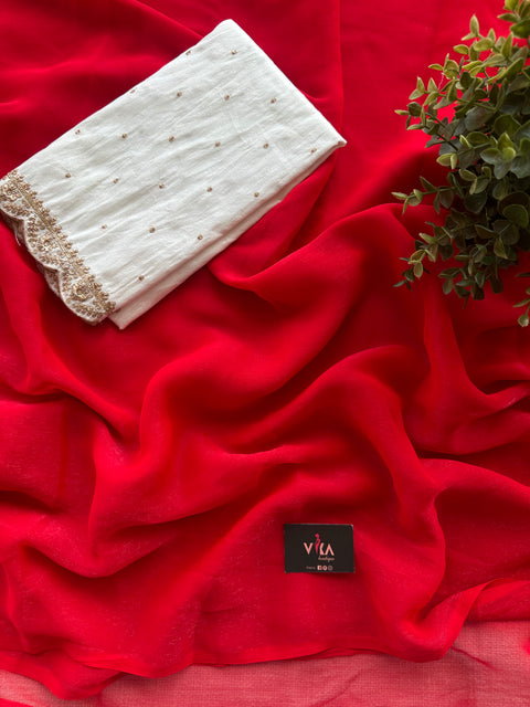 Raw silk blouse with plain chiffon saree