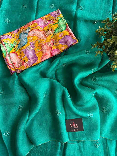 Emb blouse with sequins work jute saree