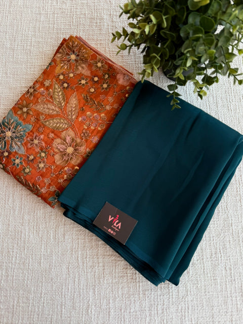Green organza saree with seq work blouse