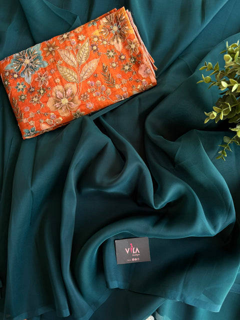 Green organza saree with seq work blouse
