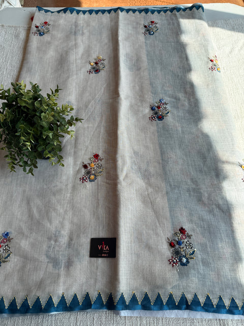 Hand emb Linen saree with printed blouse