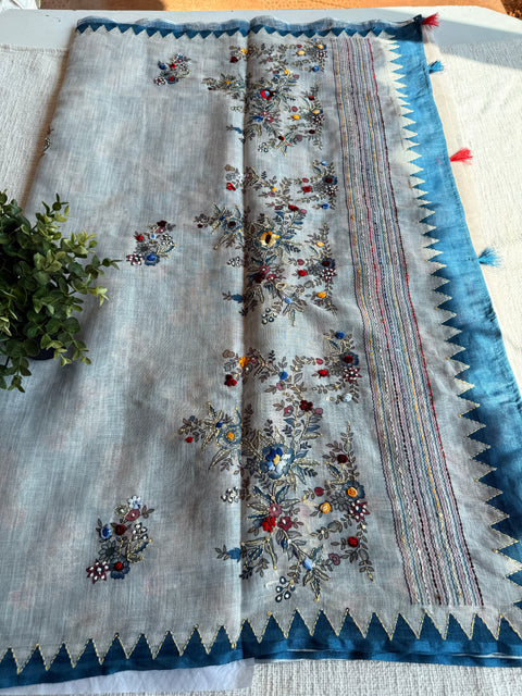 Hand emb Linen saree with printed blouse