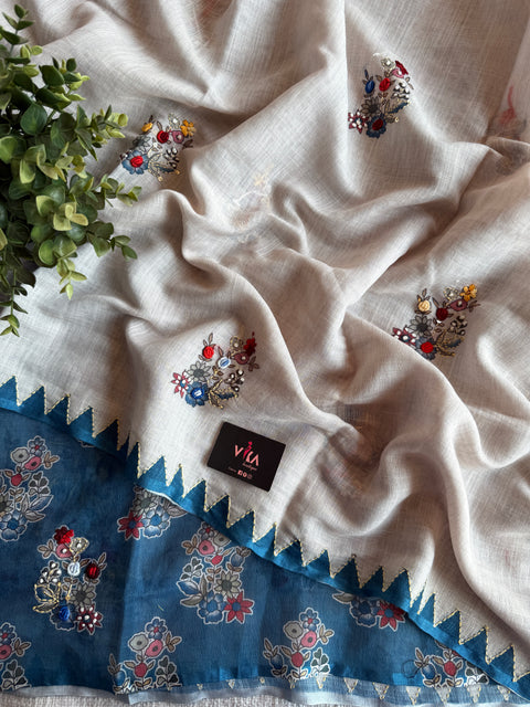 Hand emb Linen saree with printed blouse