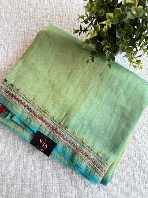 Hand emb shimmer Tissue saree