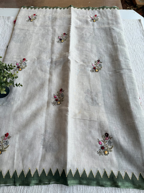 Hand emb Linen saree with printed blouse