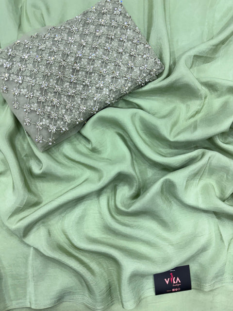 Light green satin crepe saree with blouse